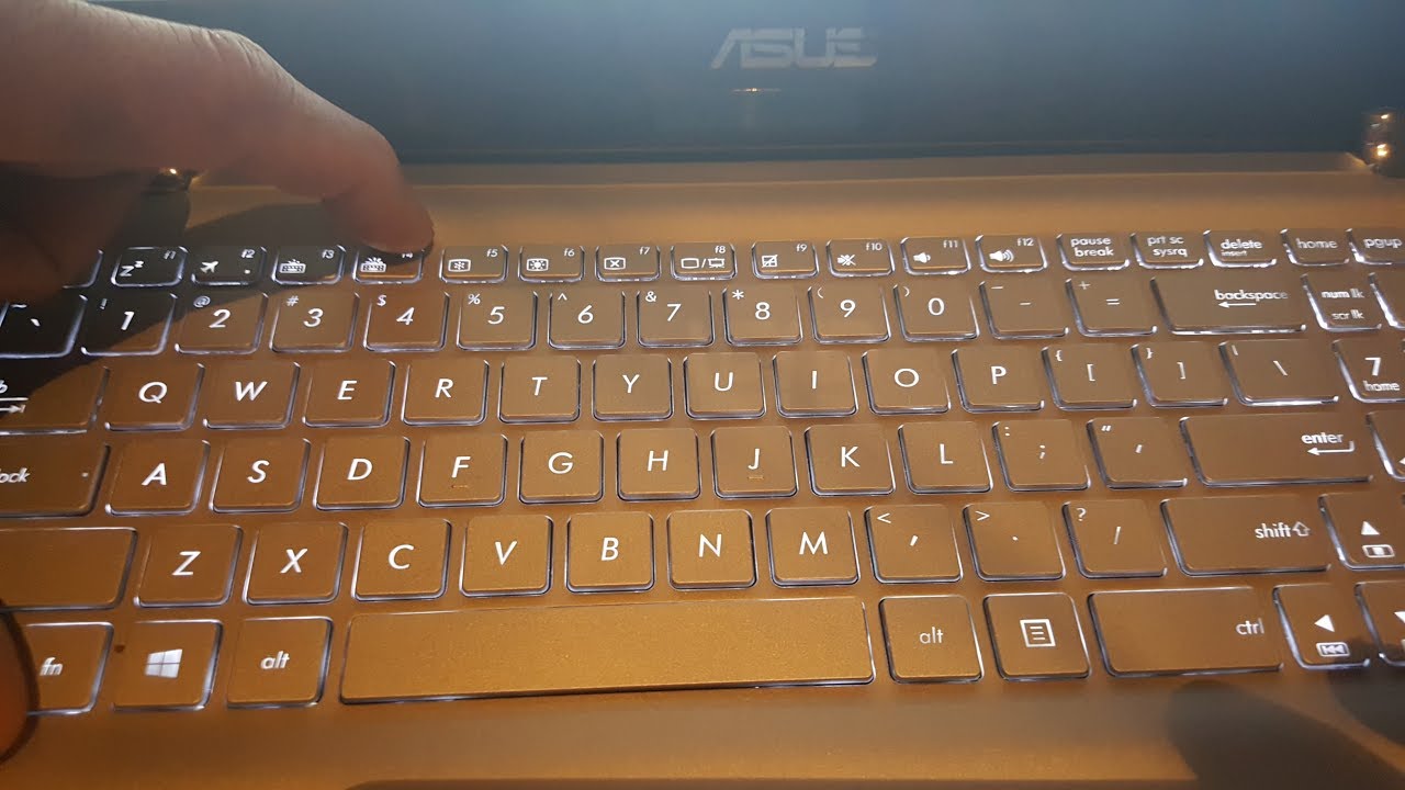 how to turn down brightness on toshiba laptop